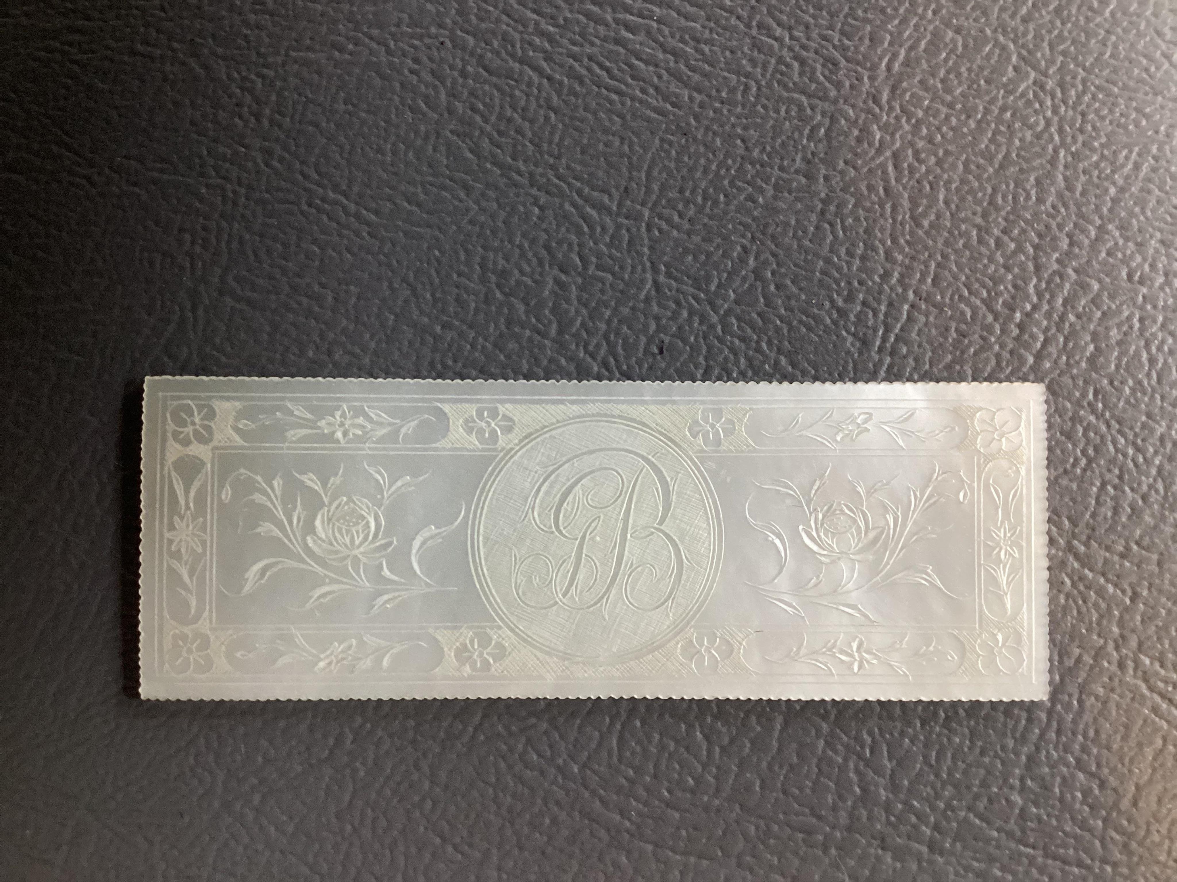 Two Chinese gilt decorated black lacquer games boxes, containing numerous mother-of-pearl counters, 19th century